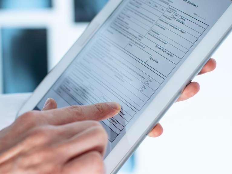 Digital records on a tablet at posh smiles in ashburn va