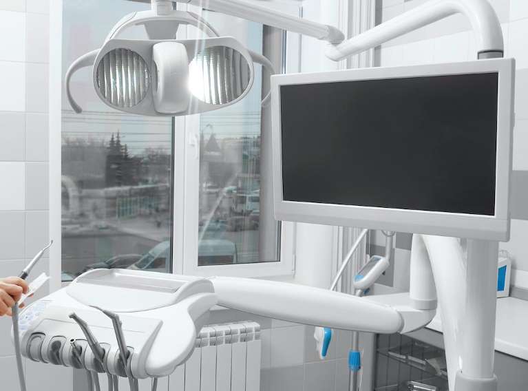 TV in treatment room for x-ray and photo display for dental patients, ashburn va